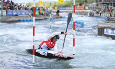 A competitor navigates through a gate at the ICF World Canoe Slalom Championships
